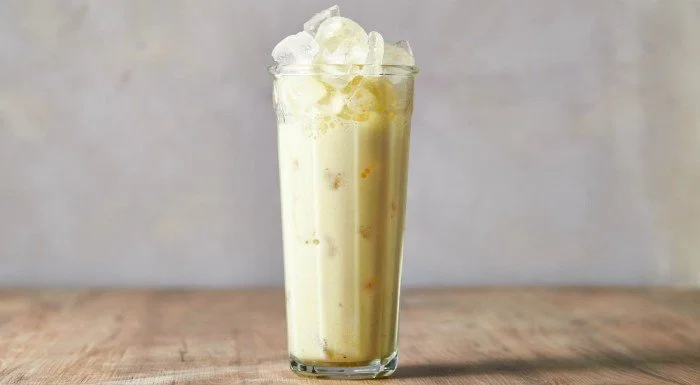 Person drinking a post-workout recovery shake